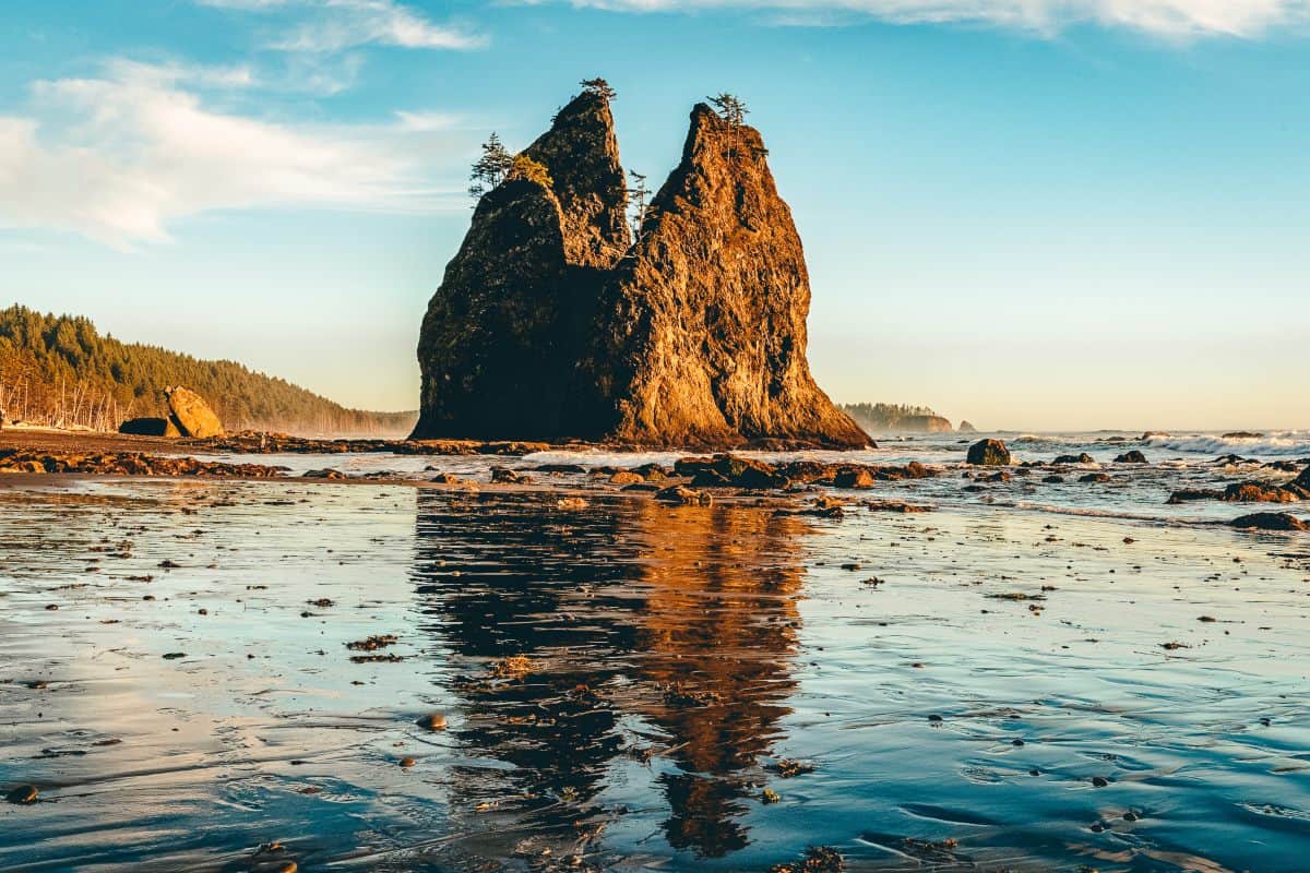 Large rock formation on a beach low tide