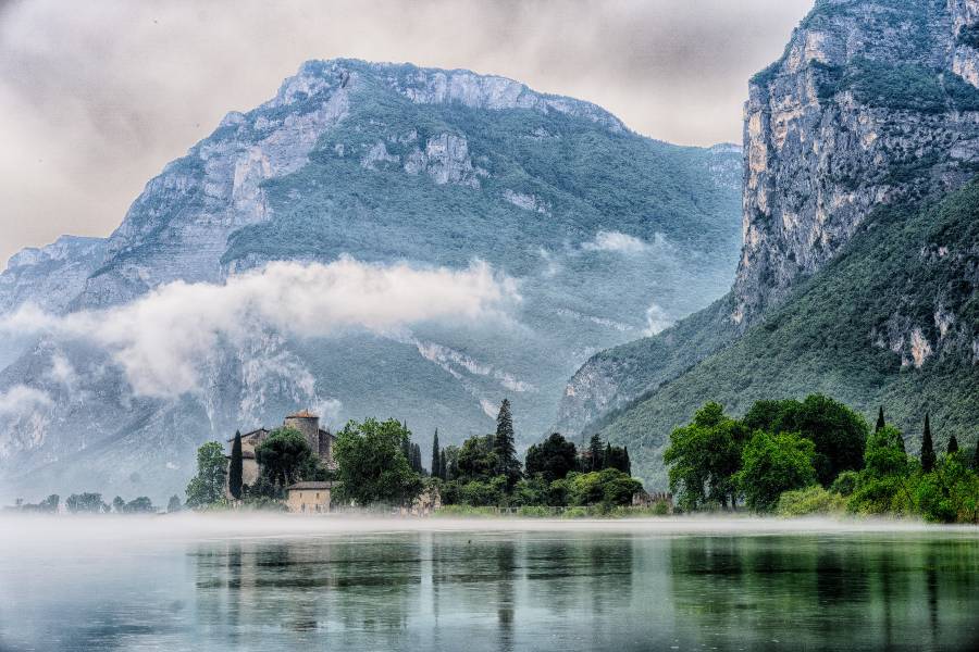 Lago di Toblino surrounded by mist