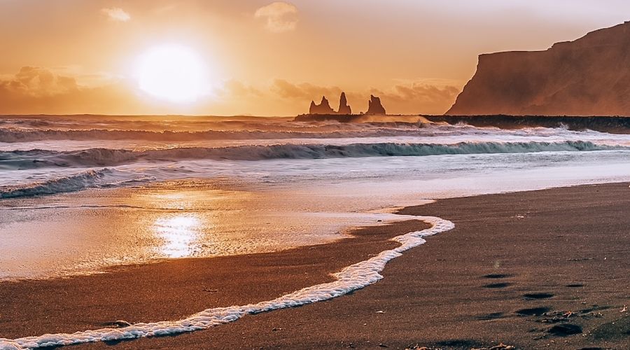 The sunsetting at Vik Black Sand Beach in Iceland